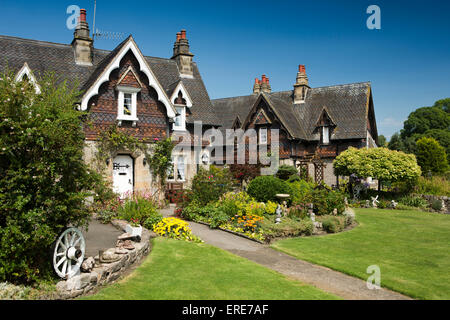 UK, England, Staffordshire, Ilam village, Swiss style Ilam Hall estate houses with floral gardens Stock Photo