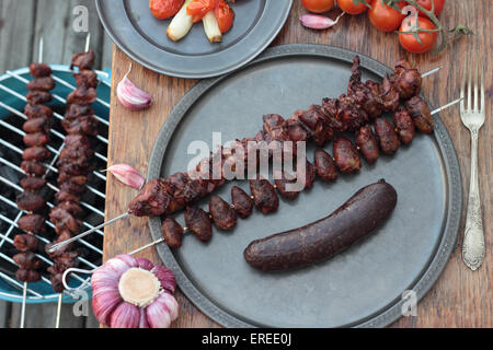Hearts and livers just taken from the barbecue. Stock Photo