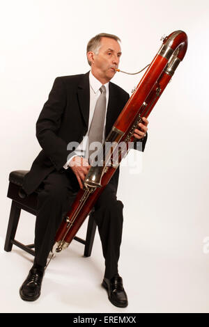 Contra Bassoon player in playing position Stock Photo