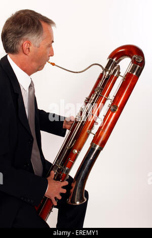 Contra Bassoon player in playing position Stock Photo