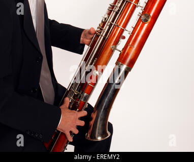 Contra Bassoon player in playing position, close up detail of hand positions on keys Stock Photo