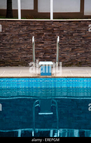 Diving board straight in front of it, swimming pool without people Stock Photo