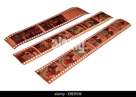 Strips of  old 35 mm colour negative on white Stock Photo