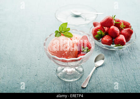 Fresh strawberry ice cream with strawberries Stock Photo