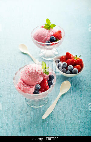 Fruit ice cream with blueberries and strawberries Stock Photo
