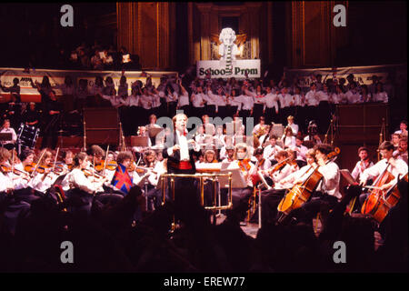 Antony Hopkins CBE  conducting  youth orchestra during the finale of one of the Schools Prom concerts, Royal Albert Hall, Stock Photo