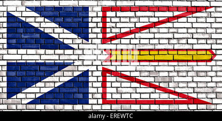 flag of Newfoundland and Labrador painted on brick wall Stock Photo