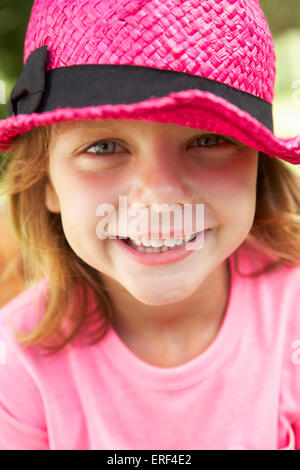 Portrait of cute girl wearing straw hat Stock Photo - Alamy