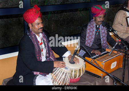 Indian tabla and harmonium players. The musicians are Rafik Mohamed (left) and Barkat Khan, pictured here wearing the Stock Photo