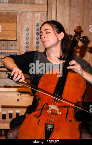 Natalie Clein playing cello during rehearsals at the Turner Sims Concert Hall in Southampton, Hampshire, England Stock Photo