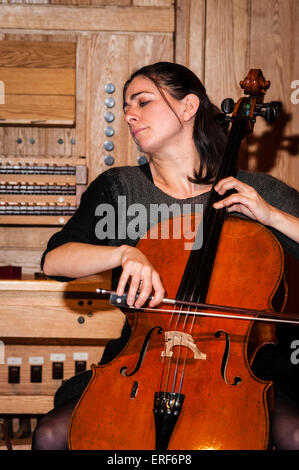 Natalie Clein playing cello during rehearsals at the Turner Sims Concert Hall in Southampton, Hampshire, England Stock Photo