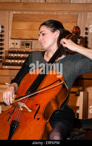 Natalie Clein playing cello during rehearsals at the Turner Sims Concert Hall in Southampton, Hampshire, England Stock Photo