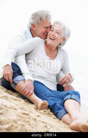 Senior couple sitting together in their van Stock Photo - Alamy