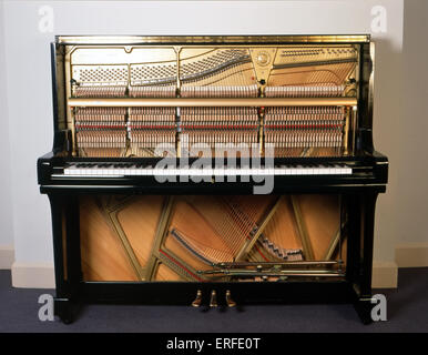 INSTR - KEYBOARD - PIANO - UPRIGHT Yamaha Upright Piano.  Whole piano, showing interior mechanism Stock Photo