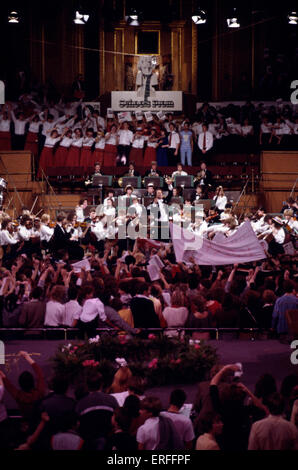 School prom - orchestra with crowd enthusiastic finale -  with conductor Antony Hopkins Stock Photo