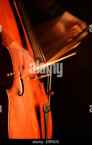 Cello - woman in playing position, cellist. Stock Photo