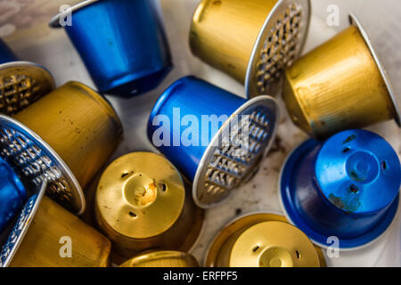 Spent or used empty Nespresso capsules, coffee capsules, aluminium capsules, raw material recycling Stock Photo