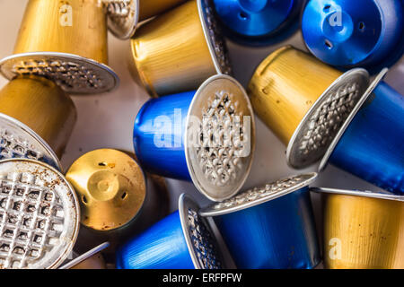 Spent or used empty Nespresso capsules, coffee capsules, aluminium capsules, raw material recycling Stock Photo