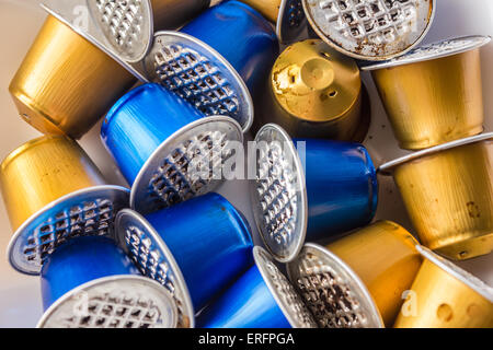 Spent or used empty Nespresso capsules, coffee capsules, aluminium capsules, raw material recycling Stock Photo