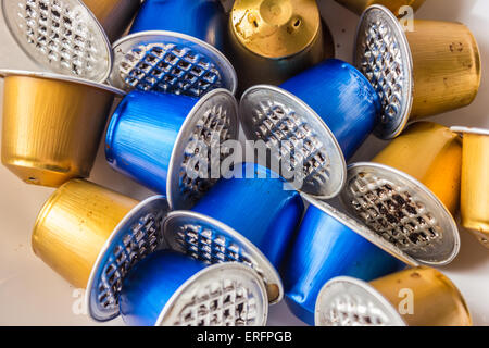 Spent or used empty Nespresso capsules, coffee capsules, aluminium capsules, raw material recycling Stock Photo