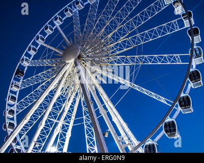The Brighton wheel on the coast at night in, East Sussex Stock Photo