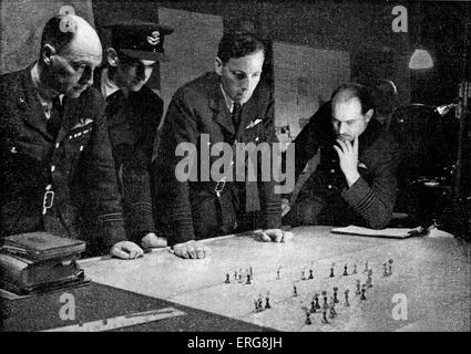 World War 2 - plotting positions during a night raid in an operations room.  From Bomber Command.  Published 1941 Stock Photo