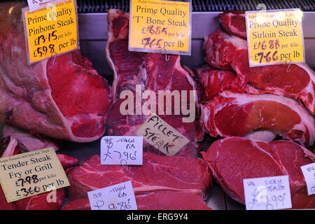 Red meat steaks for sale in a market. Stock Photo