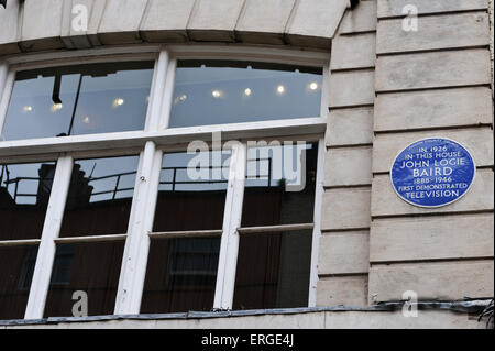 A blue commemorative plague of John Logie Baird (1888-1926) outside the house where in 1926 he first demonstrated Television. Stock Photo