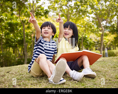 children having fun in park Stock Photo