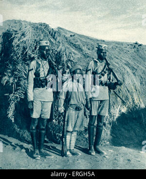 Soldiers from British East Africa during World War 1. 1916. Middle soldier of 2nd Kashmir Rifles, Indian Imperial Service Corps Stock Photo