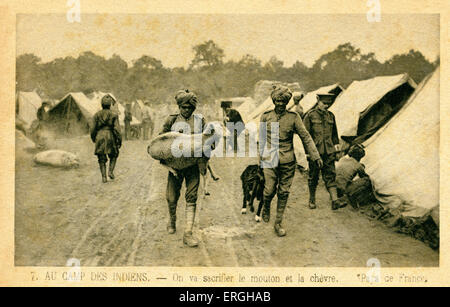 World War I: Indian encampment in France. Two soldiers going to sacrifice a sheep and a goat. British Indian Army at the Western Front. From French postcard series 'Pays de France'. Stock Photo