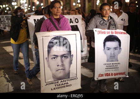 Sao Paulo, Brazil. 2nd June, 2015. People hold placards during the 'Caravan 43 South America', in support of companions and family members of the 43 Mexican students of the Normal Rural School 'Raul Isidro Burgos' of Ayotzinapa that went missing, in downtown Sao Paulo, Brazil, June 2, 2015. Credit:  Rahel Patrasso/Xinhua/Alamy Live News Stock Photo
