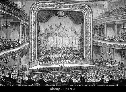 19th century theatre interior, showing the stage, seating, audience and performers. Musical with conductor waving baton for Stock Photo