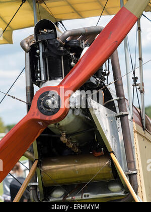 the engine and propeller of a 1912 era replica BE2c biplane(built in 1969) on display,at Aerexpo 2015 aviation event,at Sywell a Stock Photo