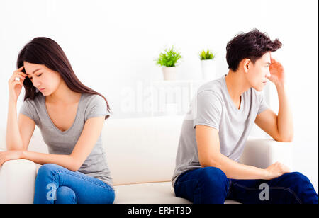 young Couple not talking after  fight  in living room Stock Photo