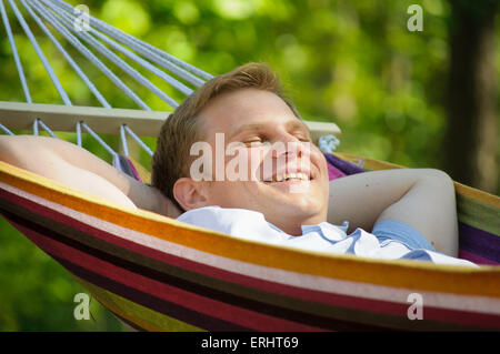 Young man sleeping in a hammock Stock Photo