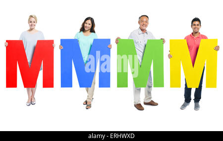 Multi-ethnic group of people holding letter 'M' Stock Photo