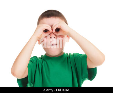 boy looks through his hands like binoculars Stock Photo