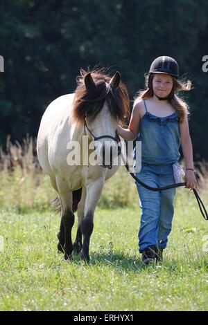 girl and Icelandic horse Stock Photo