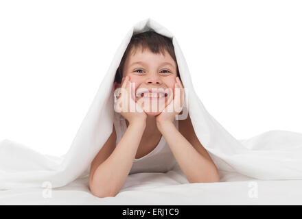 cheerful boy hiding under the blanket Stock Photo