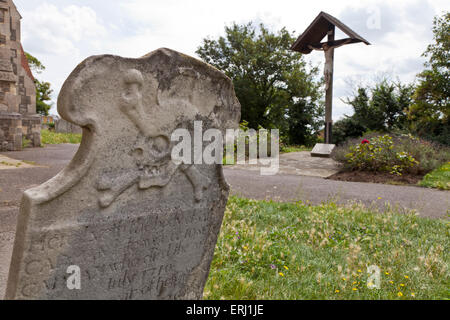 Skull and crossbones on a gravestone in the churchyard Leigh-On Sea Essex England United Kingdom Europe Stock Photo