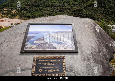 Memorial stone with plaque above Waimahara Wharf in Shakespeares Bay, Picton, New Zealand. Stock Photo