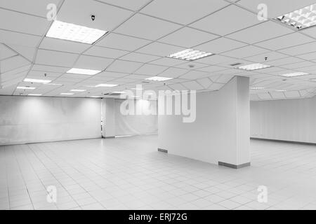 Open space, abstract white empty office interior with walls, lights and column Stock Photo