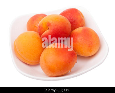 apricots on plate isolated Stock Photo
