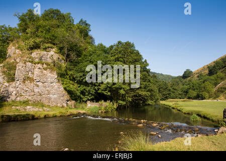 UK, England, Derbyshire, Dovedale, River Dove flowing over weir in summer Stock Photo