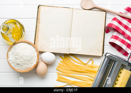 the cookbook and pasta ingredients Stock Photo