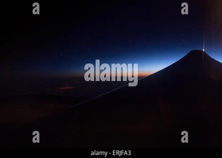 Night time flight - view from plane window Stock Photo