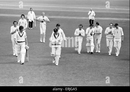 Australian tour of Great Britain for the Ashes. First test match at Old Trafford between England and Australia.  Dennis Lillee and John Gleeson, the last two Aussie batsmen, are clapped off the field by England players after losing a gallant match. 13th June 1972. Stock Photo
