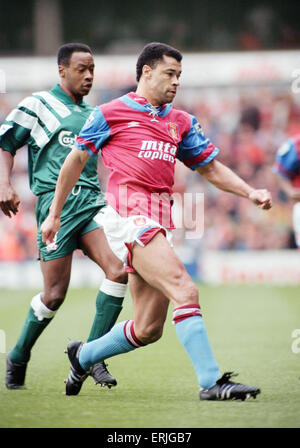 Aston Villa footballer Paul McGrath in action during their Premier league match against Liverpool at Villa Park, challenged by Mark Walters. 19th September 1992. Stock Photo