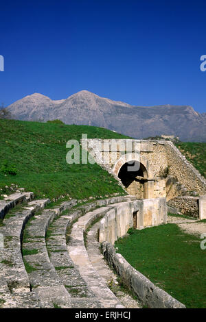 Italy, Abruzzo, Alba Fucens, roman amphitheatre ruins and Mount Velino Stock Photo